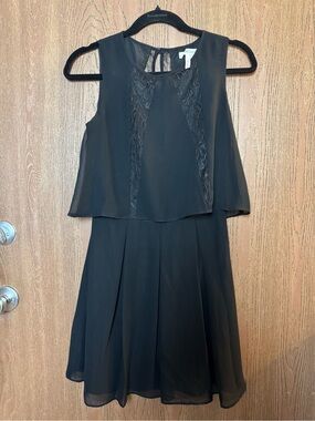 BCBGeneration Sleeveless Black Chiffon Overlay Mini Dress with Lace Trim